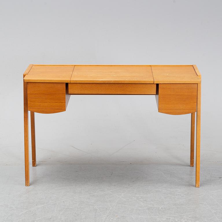 A 1960's teak dressing table.