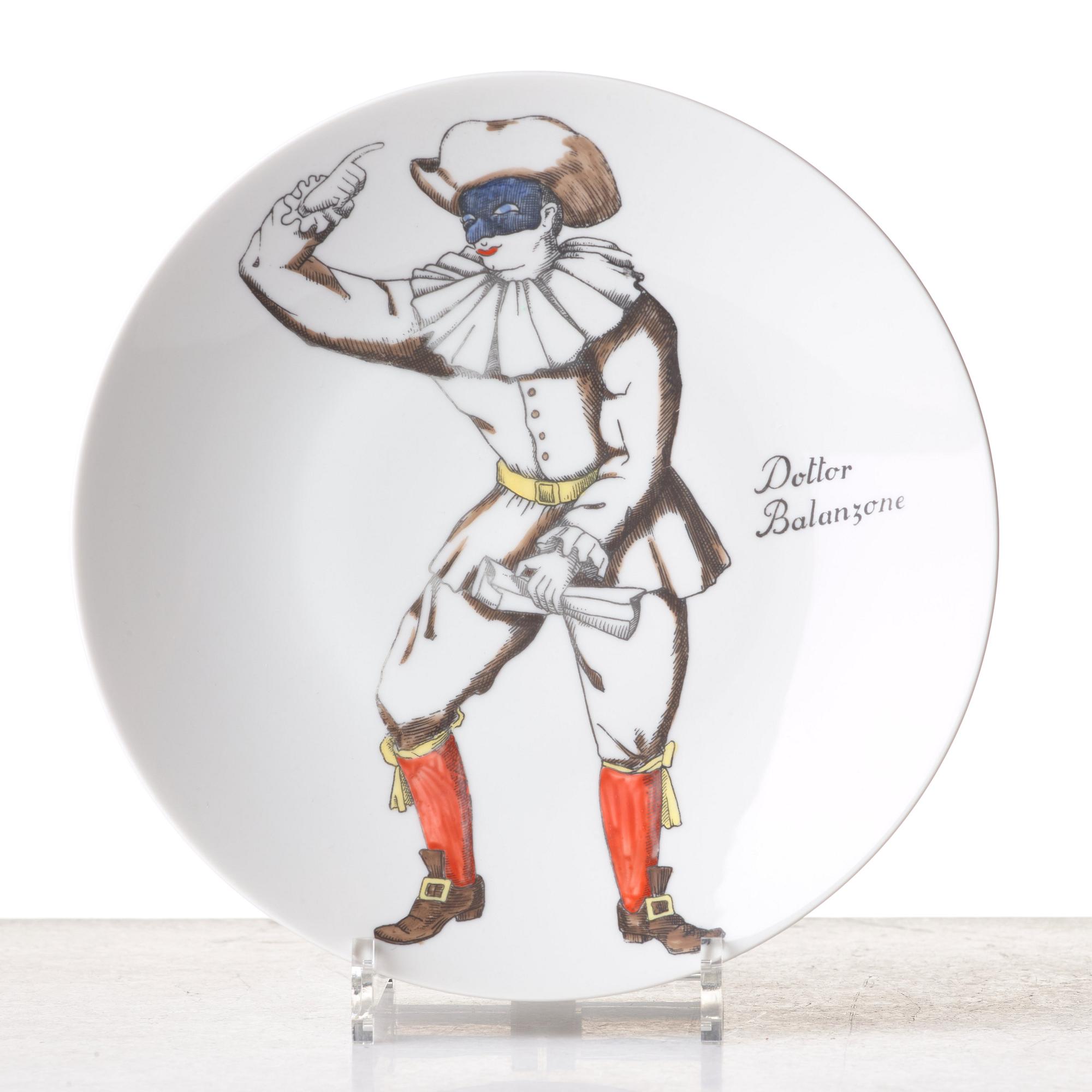 Piero Fornasetti, a set of 12 "Maschere Italiane" porcelain plates, Milan, Italy.