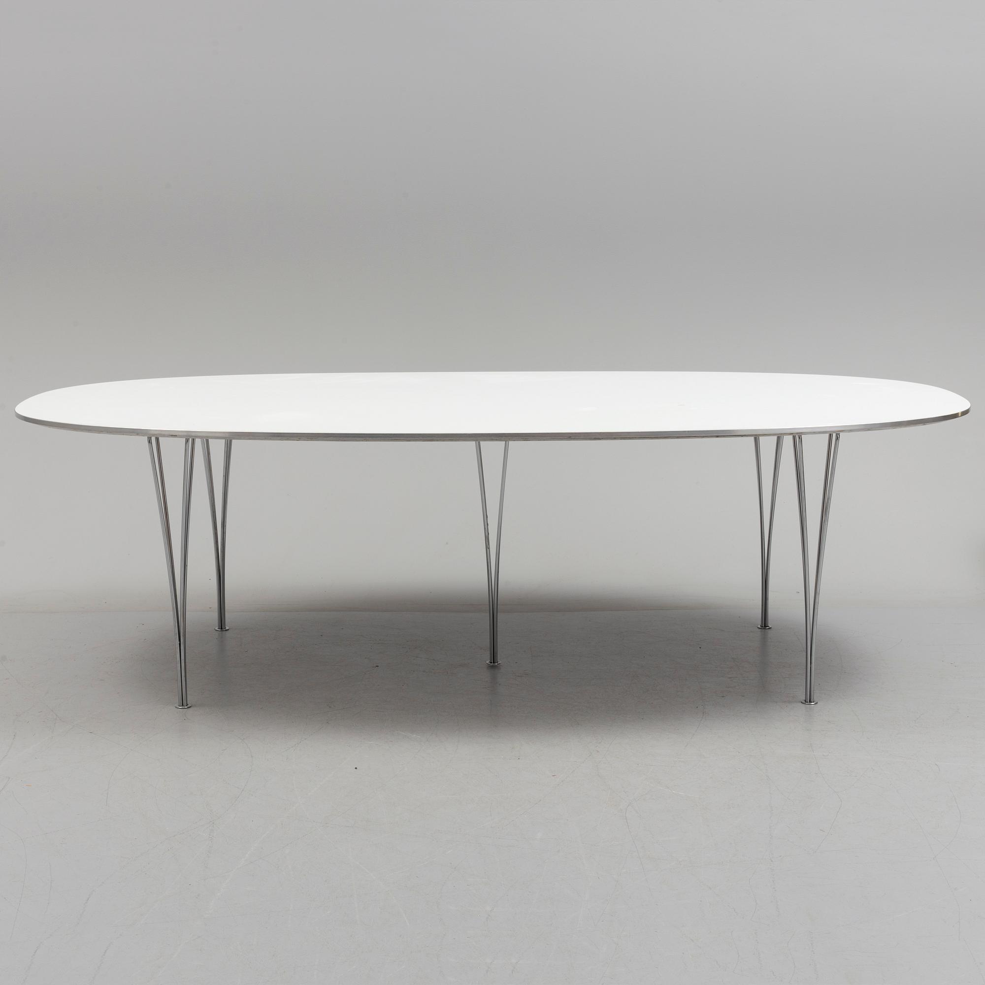 A "Superellips" table by Bruno Mathsson and Piet Hein for Fritz Hansen.