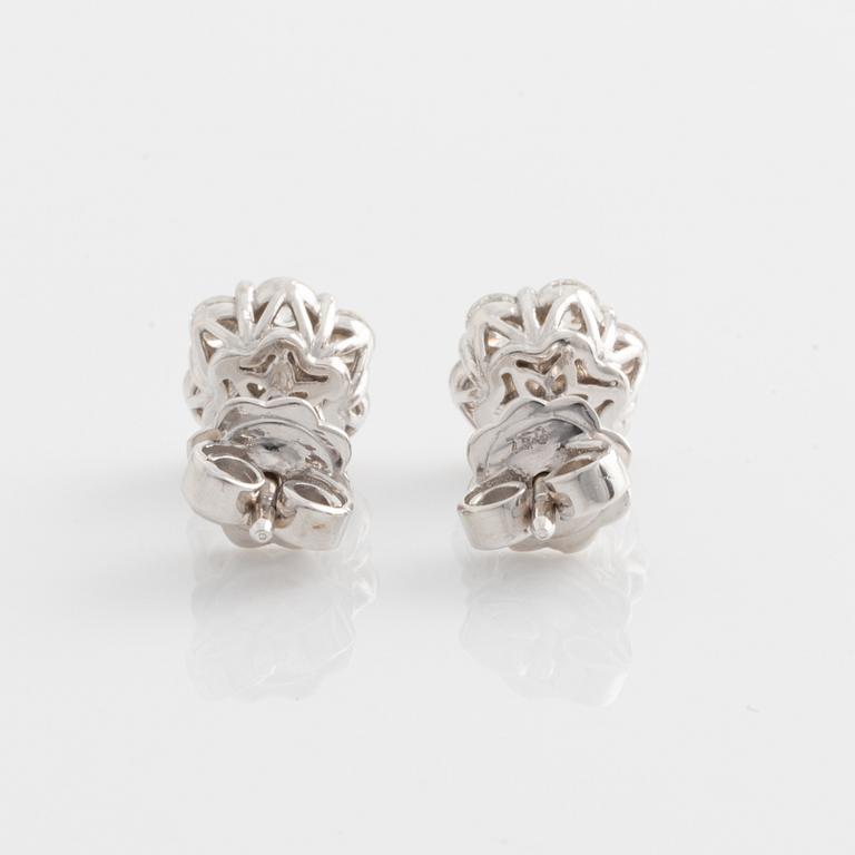 Earrings with brilliant-cut diamonds.