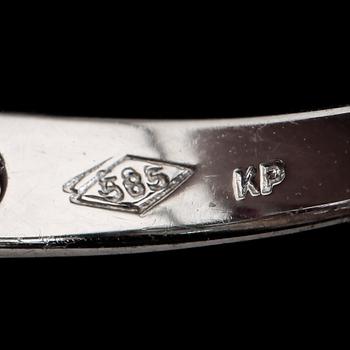 RING, 14K vitguld, rubiner och briljantslipade diamanter. Vikt ca 3 g.