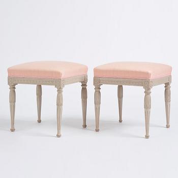 A pair of carved Gustavian stools by E. Öhrmark (master in Stockholm 1777-1813).