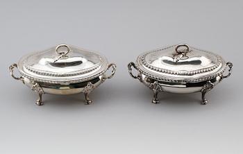 A pair of English 18th century silver sauce-tureens, marks of Sebastian & James Crespell, London 1772.