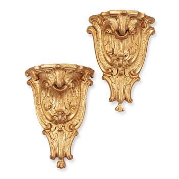 Two matched Swedish Rococo 18th century gilt wood consoles.