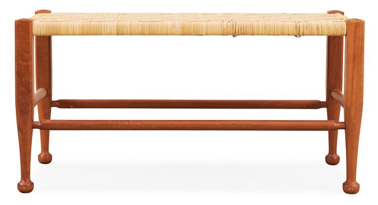 A Josef Frank mahogany and rattan bench, Svenskt Tenn, model 2009.