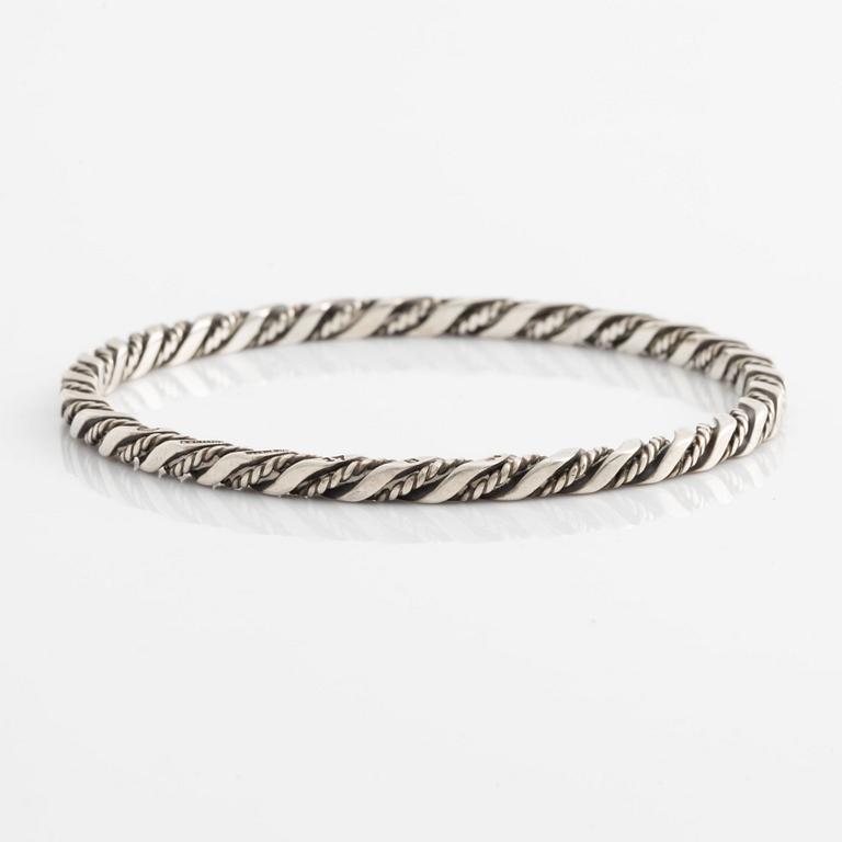 A Georg Jensen bangle in sterling silver.