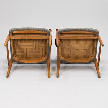 Olof Ottelin, four 1950's 'Othello' armchairs for Oy Stockmann Ab, Keravan puusepäntehdas. Finland.