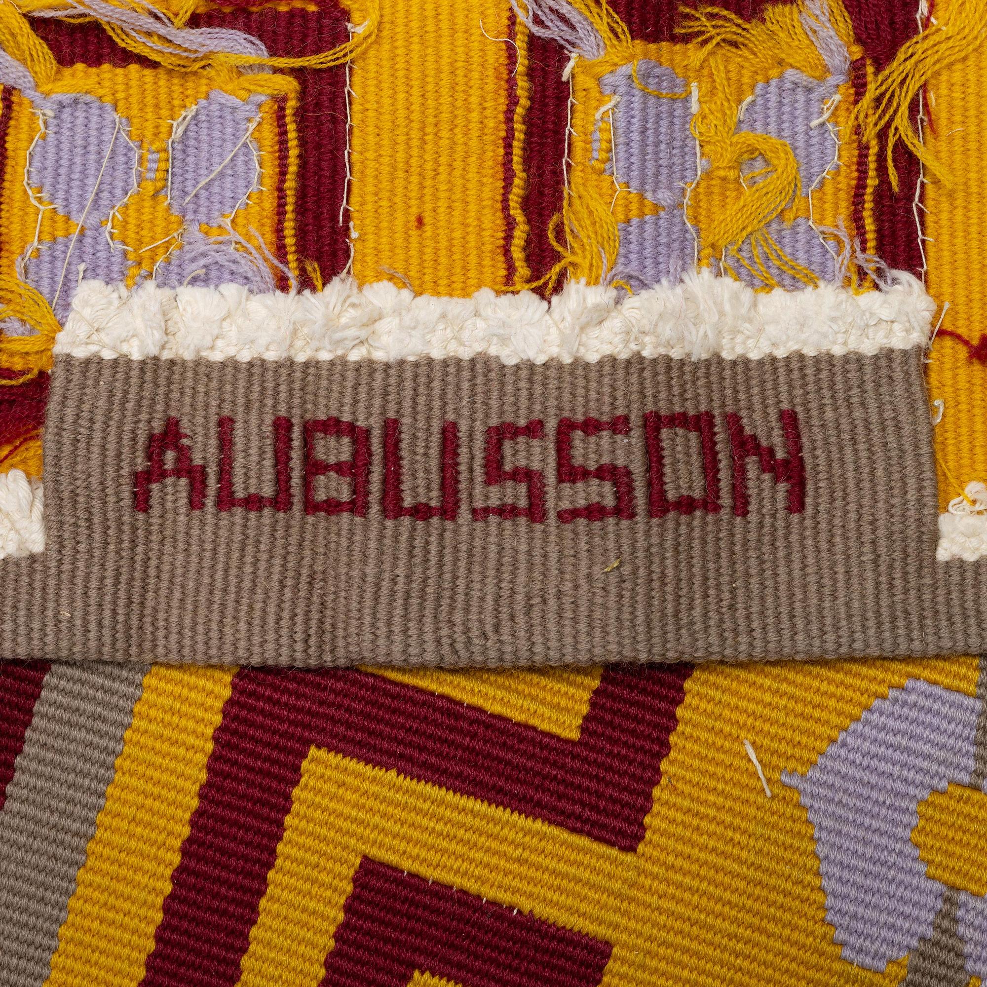 A tapestry weave carpet, c. 528 x 473 cm, signed Aubusson.