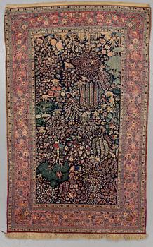 A rug, semi-antique Kashan, ca 209 x 130 cm.