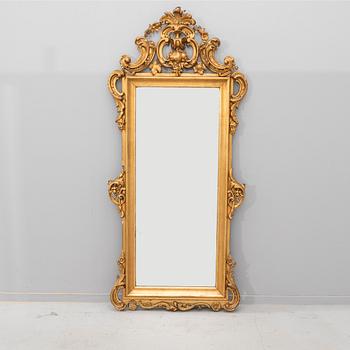 A gilded Neo Rococo mirror with console later part of the 20th century.
