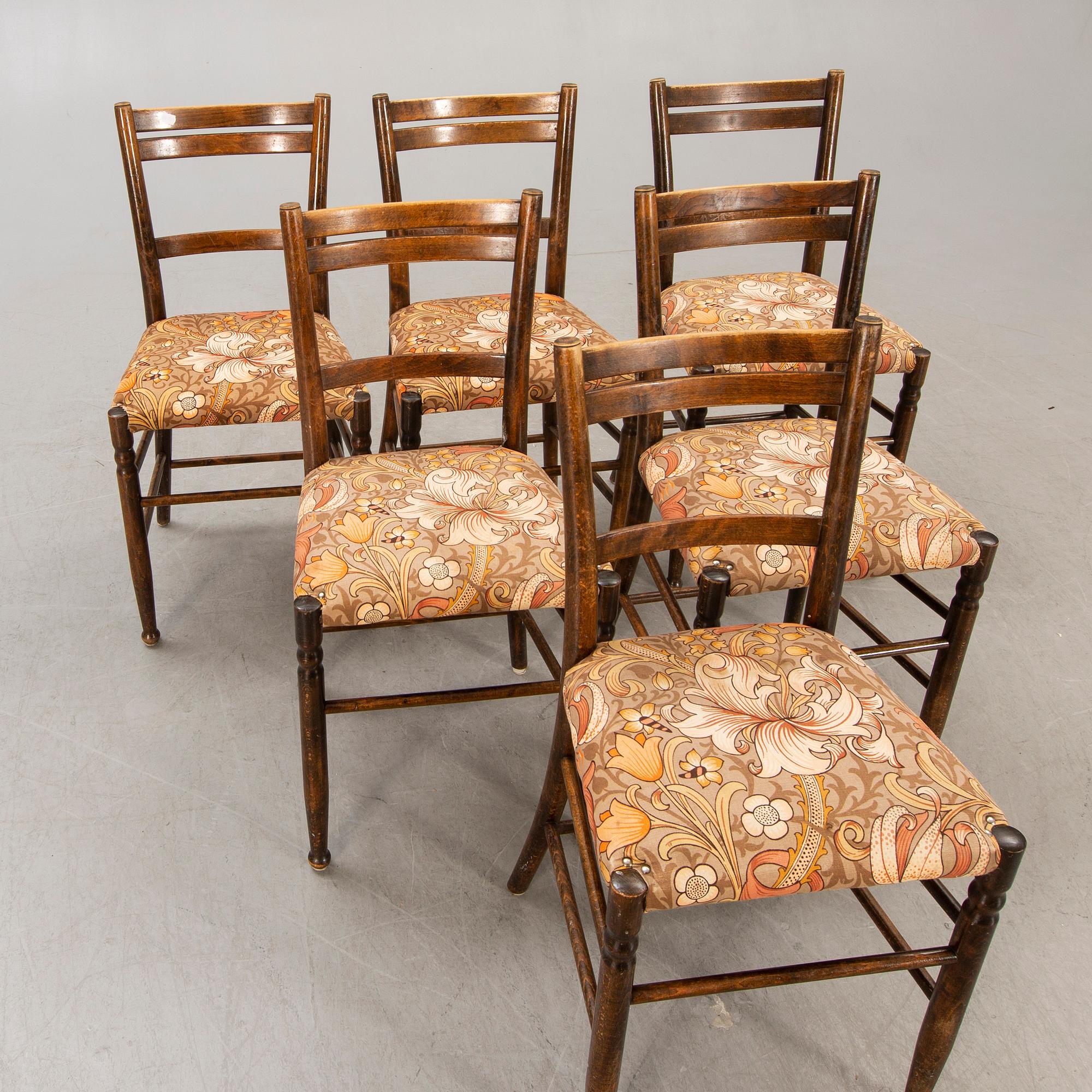 A set of six early 1900s chairs.