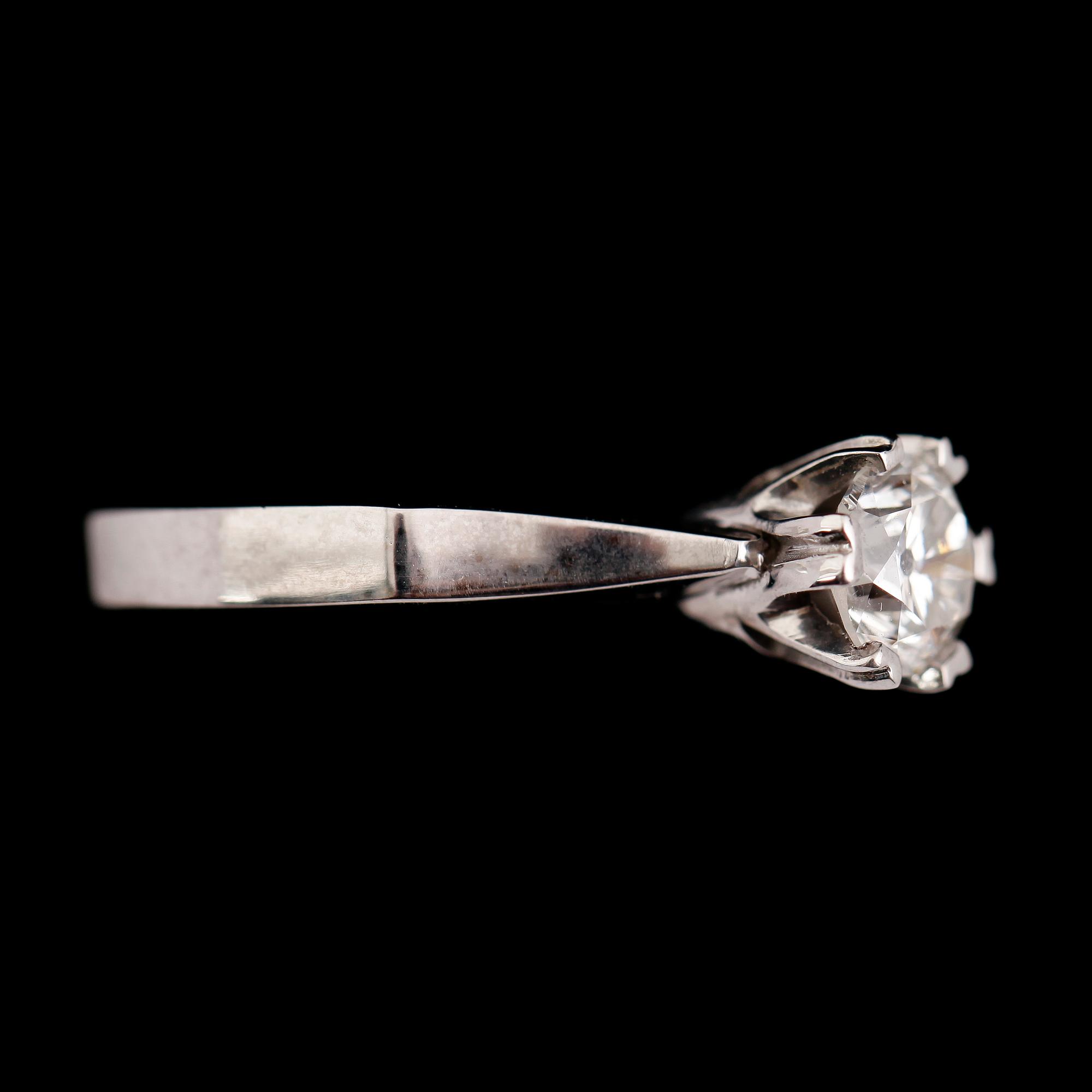 RING, 18 k vitguld, solitär briljantslipad diamant 1.02 ct.
