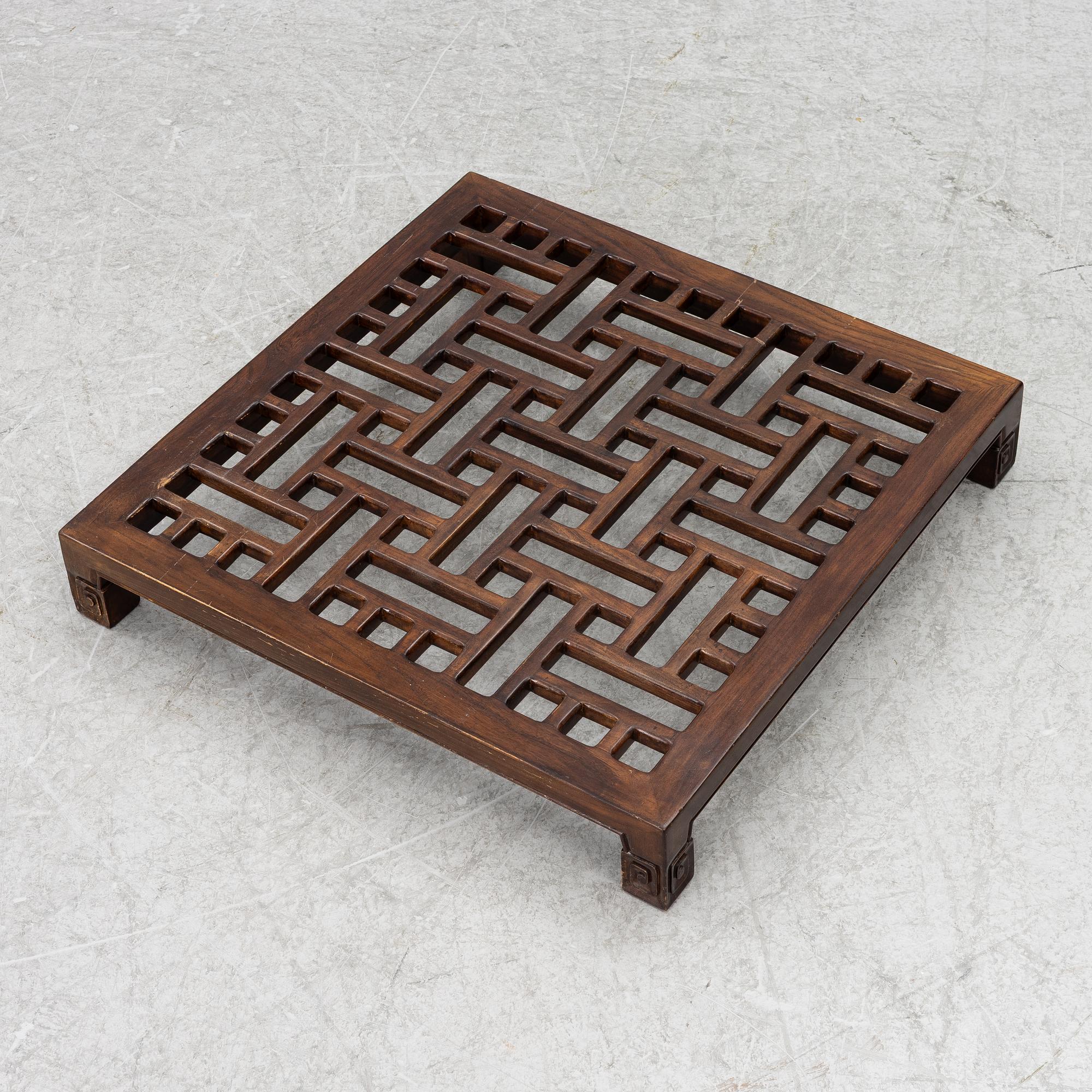 A Chinese hardwood folding chair, 20th century.