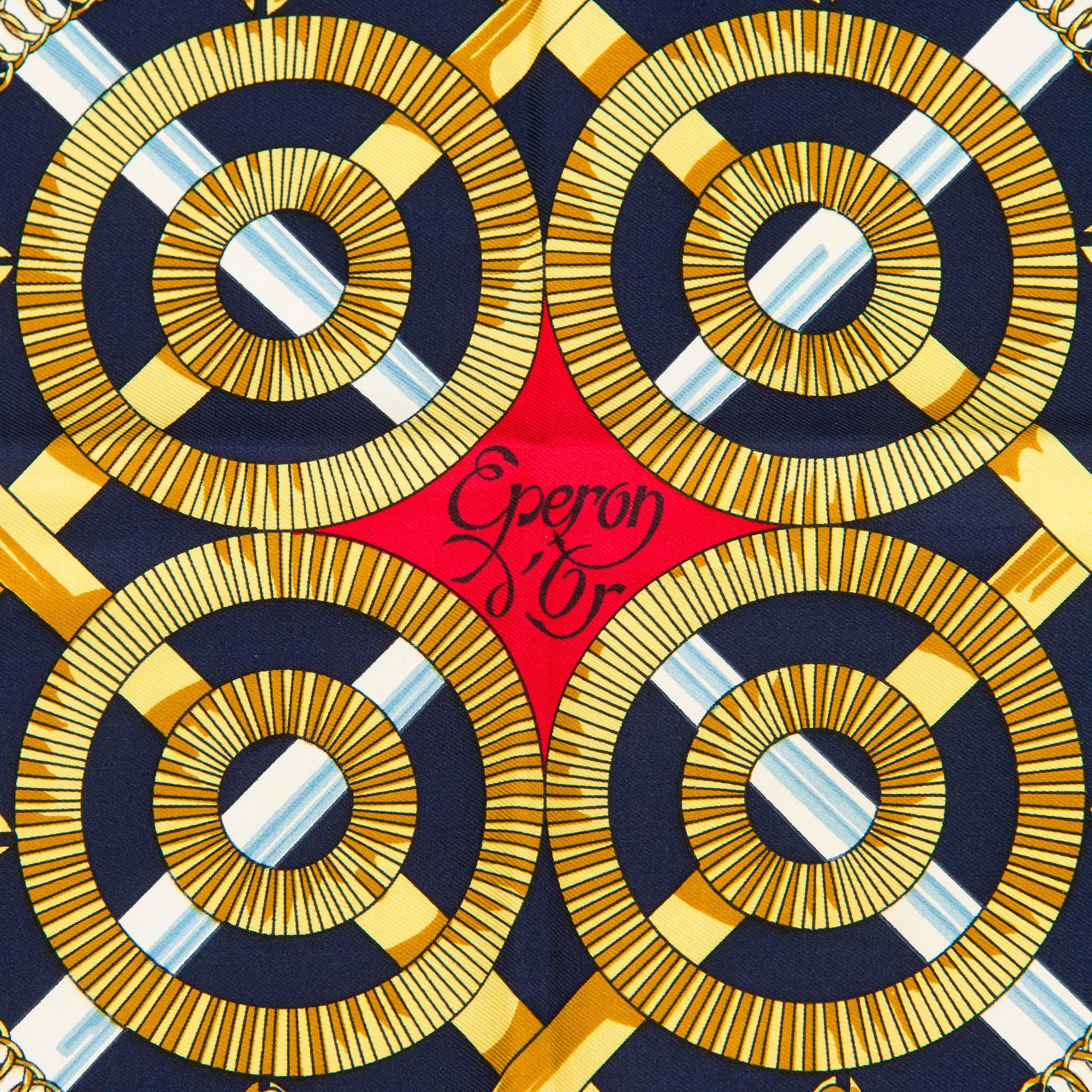 Hermès, an 'Eperon d'Or' scarf.