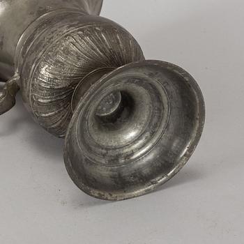 A pewter jug, probably 17th century.