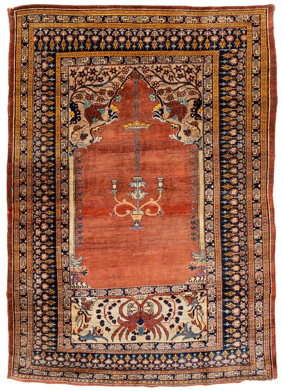 A rug, antique, silk Heriz, ca 166,5-170 cm x 116-120 cm.