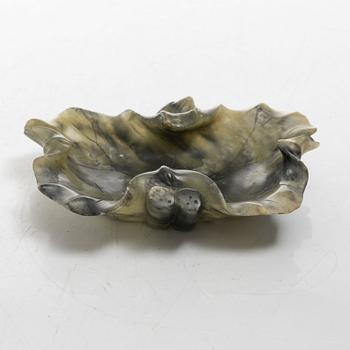 A Chinese green stone brush washer, a carved bone and a soapstone figure, partly Qing dynasty.