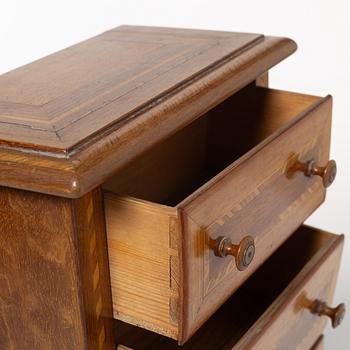 Miniatyrbyrå, 1900-talets början.