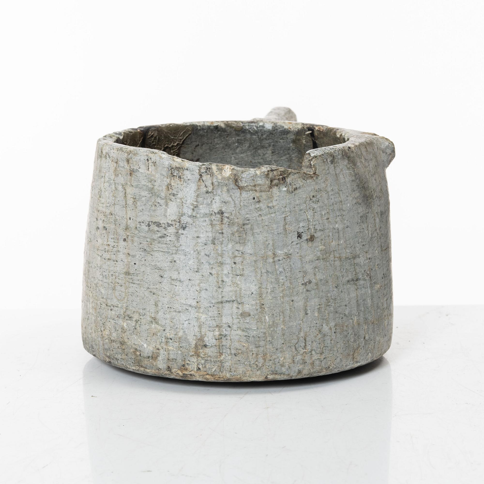 A Swedish carved soapstone jug, 19th century.