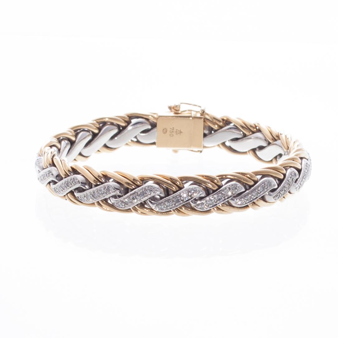 ARMBAND, 18K vitt- ovh gult guld, 8/8-slipade diamanter. Vikt ca 76,5 g.