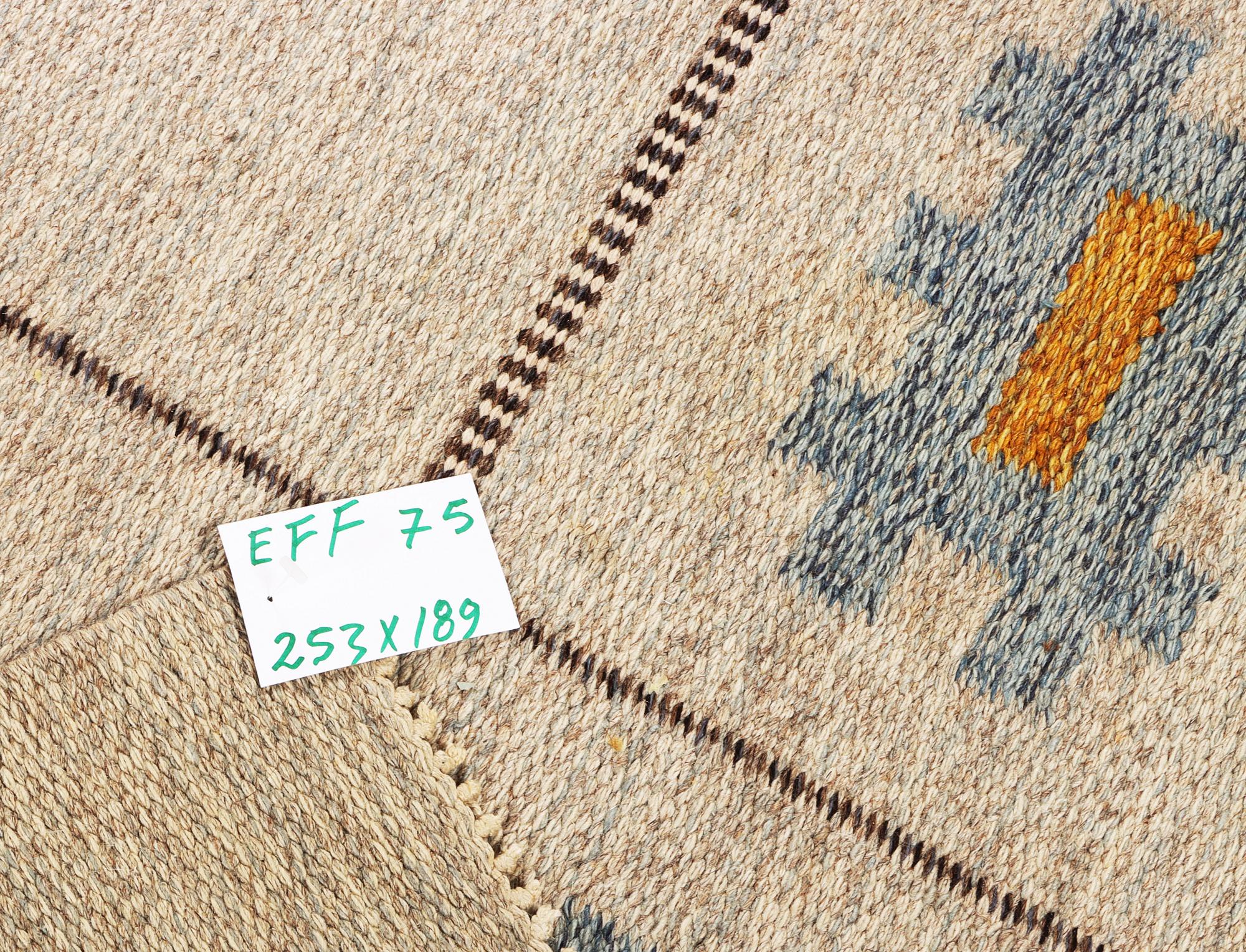 A Swedish flat weave carpet, c. 253 x 189 cm.