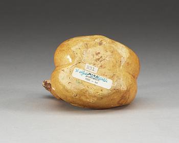 A yellow and green glazed figurine of two mandarin ducks. Ming dynasty ( 1368-1644).