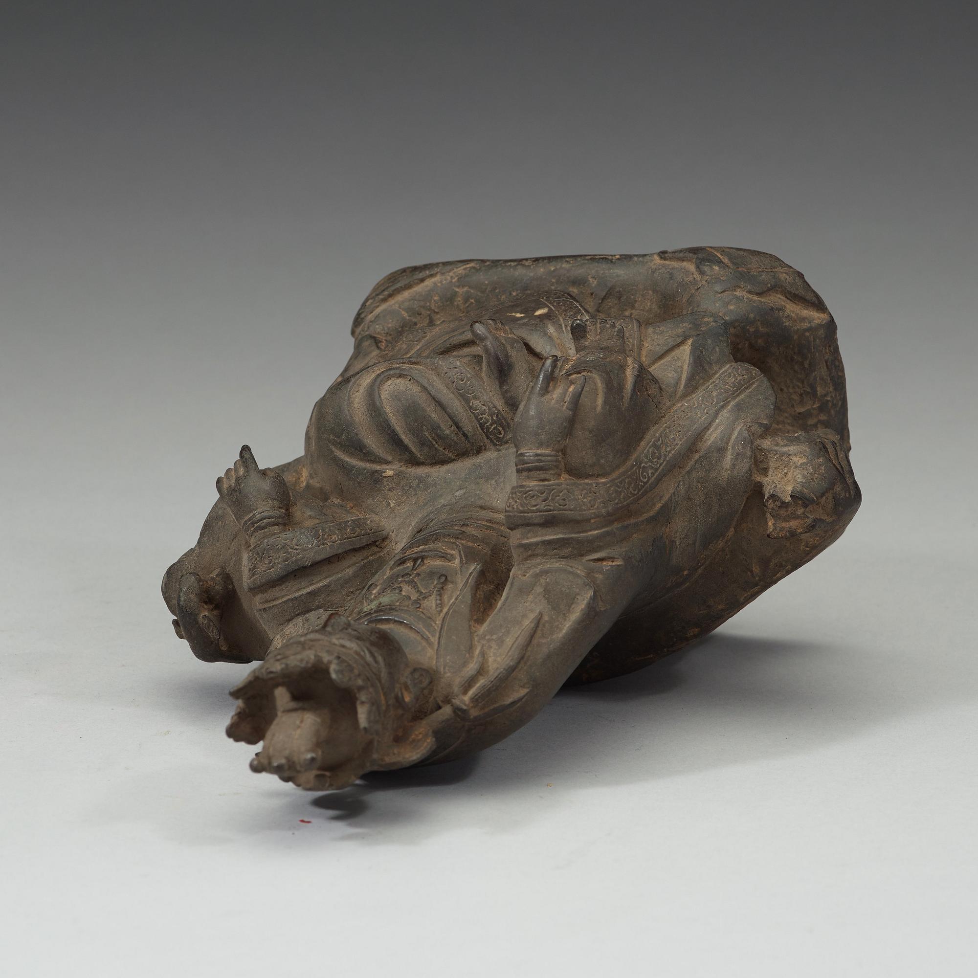 A bronze figure of a Guanyin, presumably Ming dynasty (1368-1644).