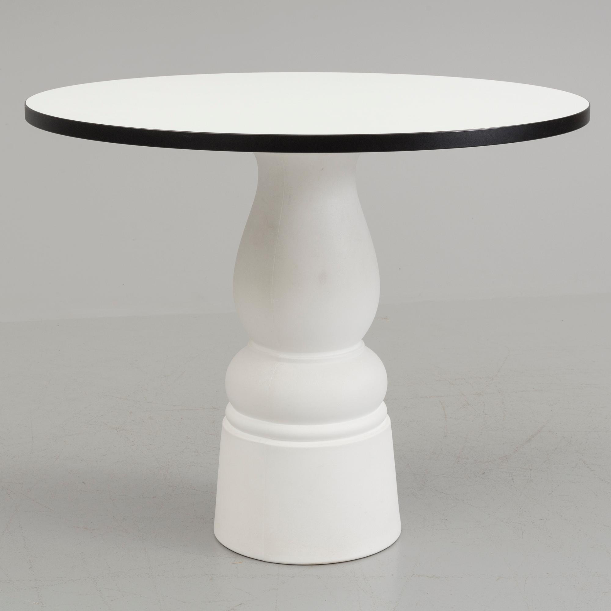 MARCEL WANDERS, a 'Container New Antiques' table by Moooi.