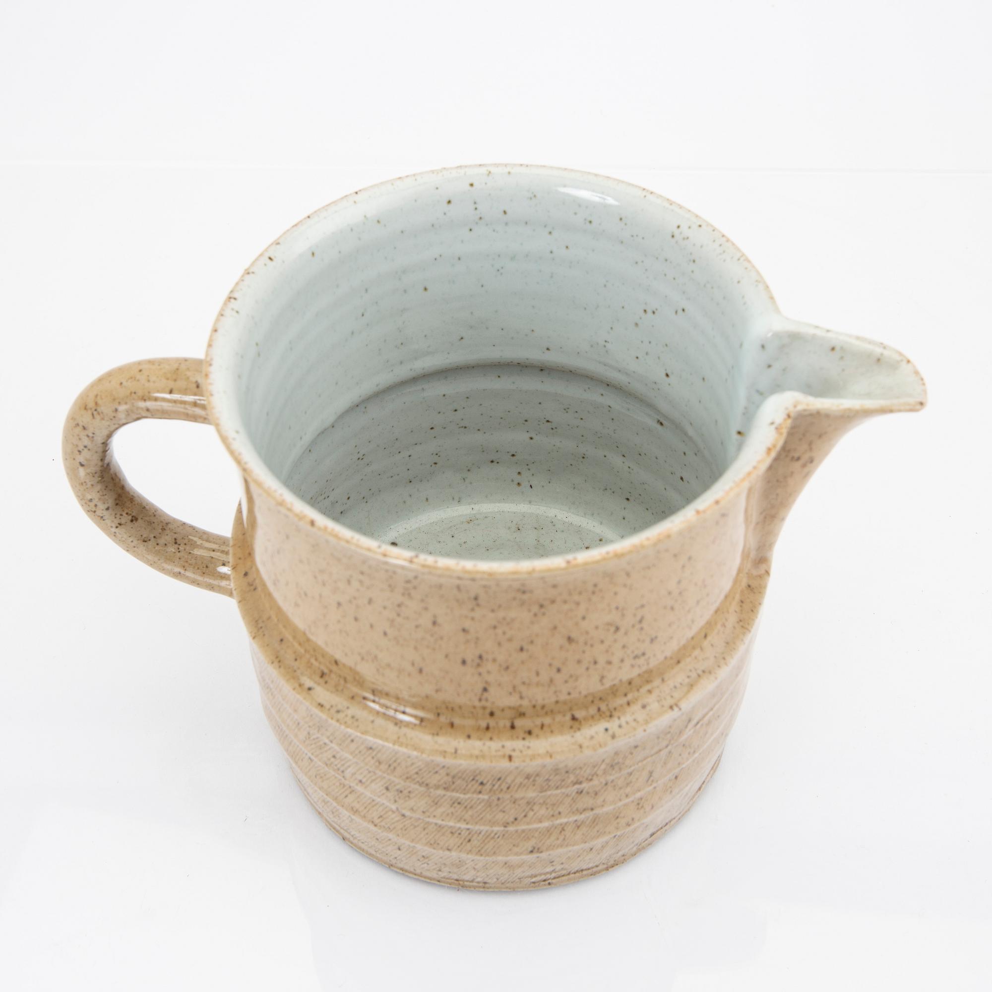 Signe Persson-Melin,  a signed and dated stonware pitcher 1982.