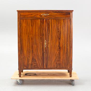 An late Gustavian-style rosewood-veneered cabinet, 19th century.