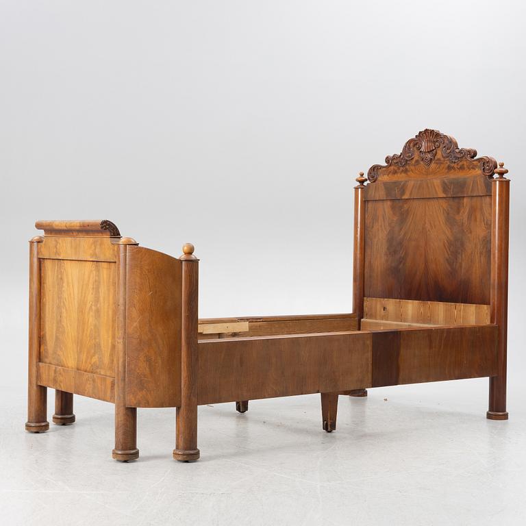 A late Empire bed, mid-19th century.