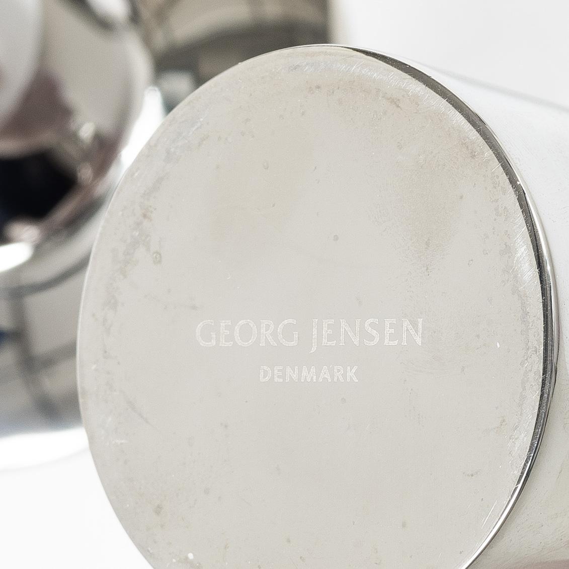 Georg Jensen, Three 'Ellipse' candelabra.