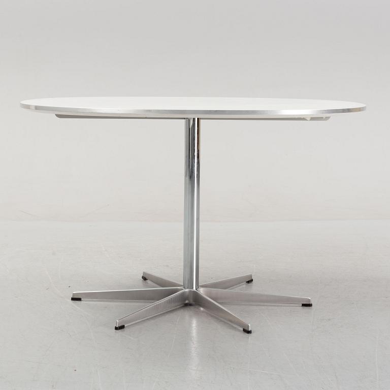 Arne Jacobsen, Bruno Mathsson & Piet Hein, a 'Supercircular' dining table from Fritz Hansen, designed 1968.