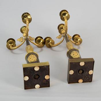 A pair of empire style candelabra, first half of the 20th century.