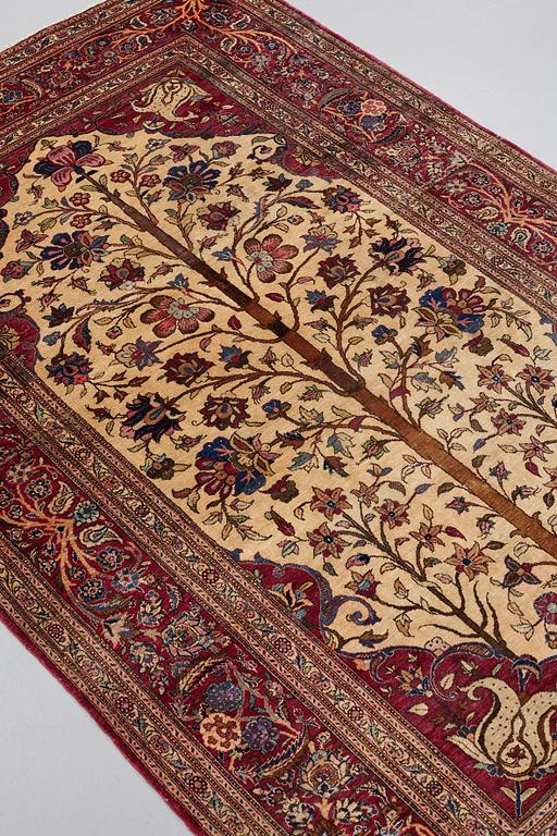 MATTO, a semi-antique silk Kashan,  ca 205 x 131,5 cm.