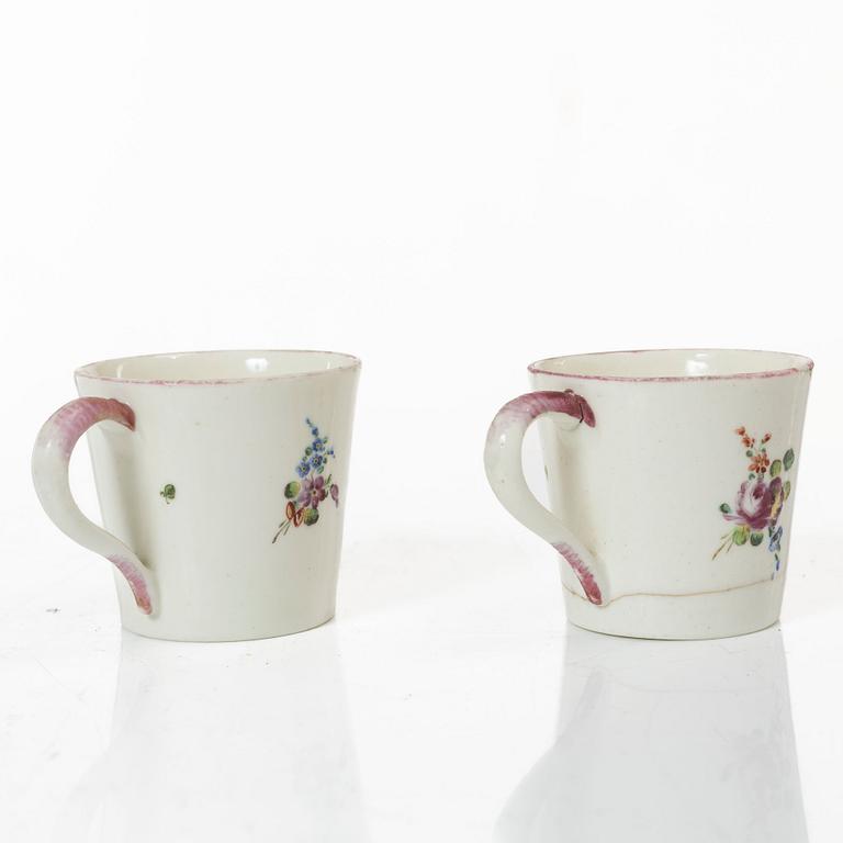 A pair of cups and saucers, France, 18th Century.