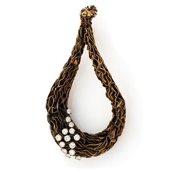 556A. Hänge/brosch Flavio Ricci  18K guld med runda briljantslipade diamanter.