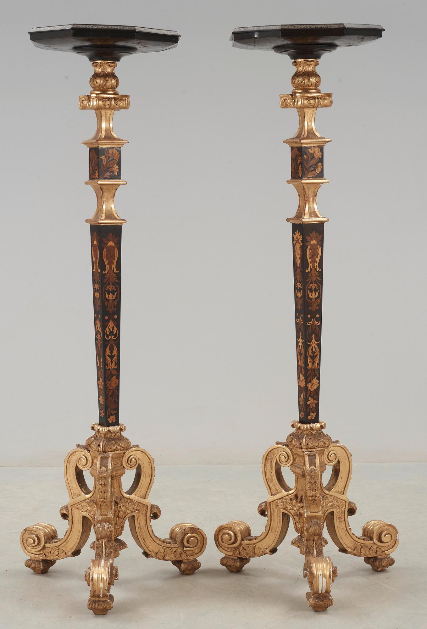 A pair of French Baroque circa 1700 candle stands.