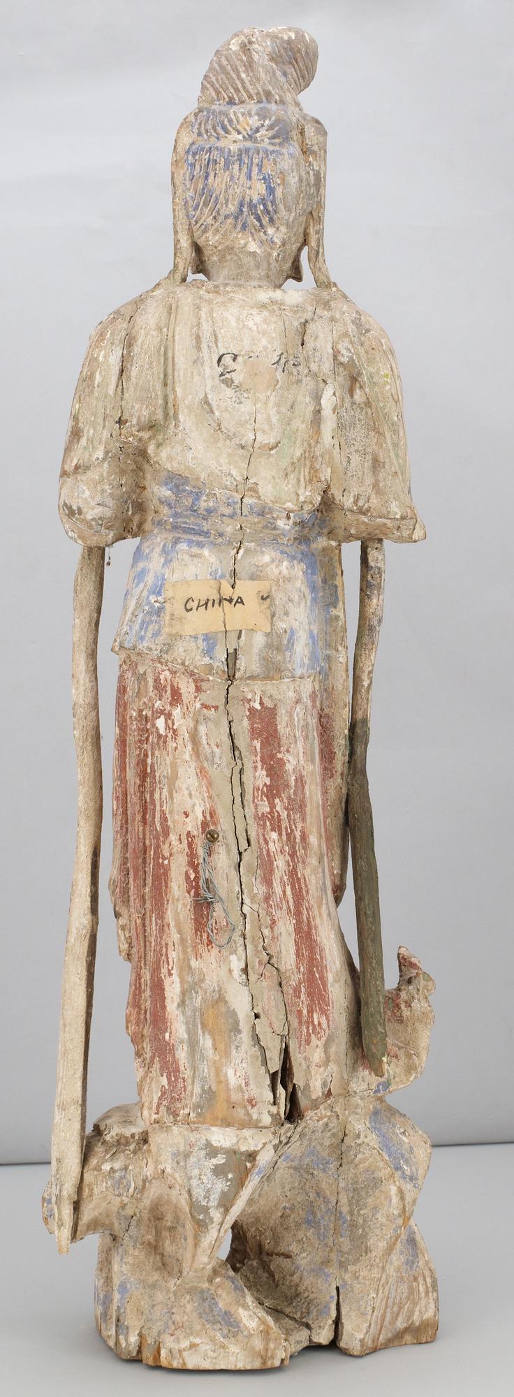 A wooden sculpture of Guanyin, Ming dynasty (1368-1644).