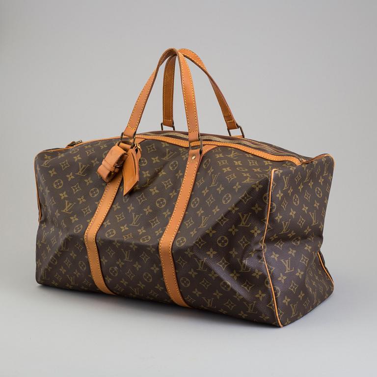 a LOUIS VUITTON "Sac Souple 55" weekend bag.