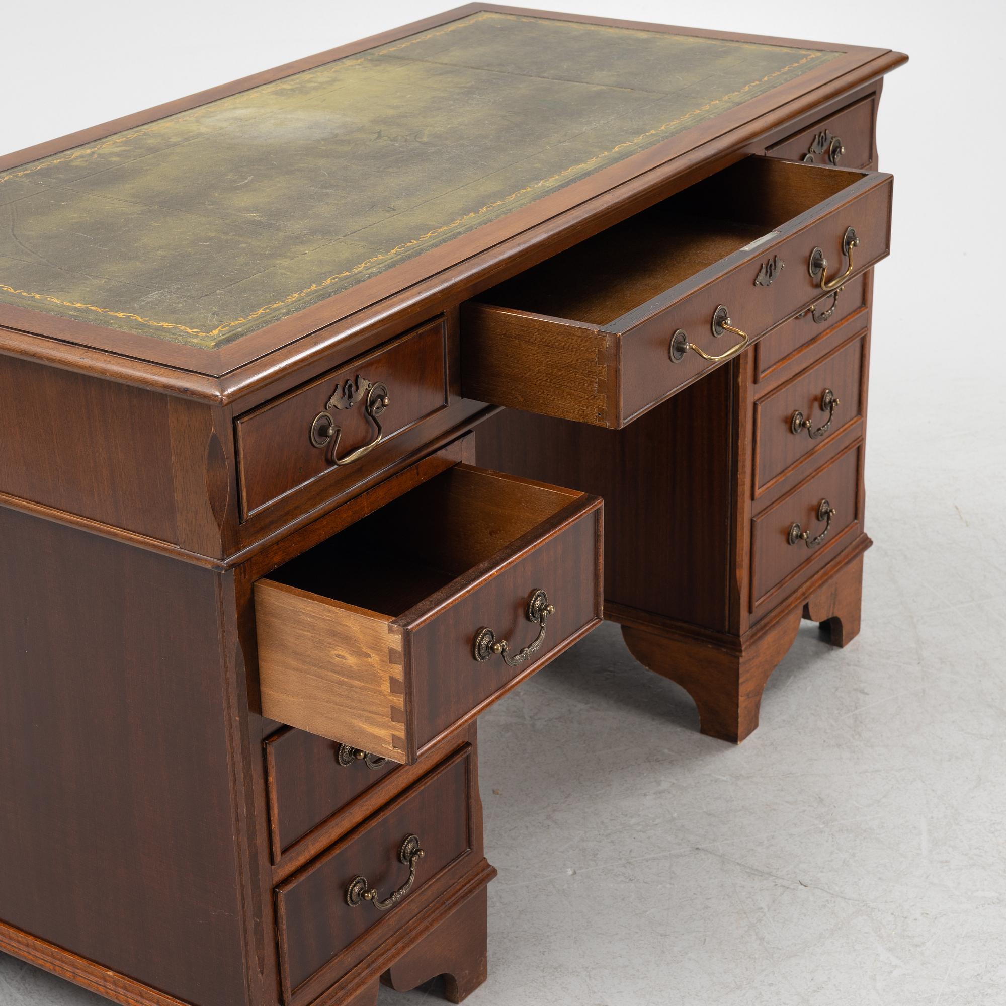 An English style mahogany desk, second half of the 20th Century.