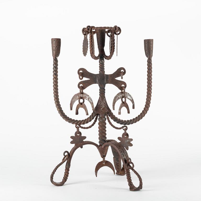 A SWedish wrought-iron four-light candlestick, circa 1900.