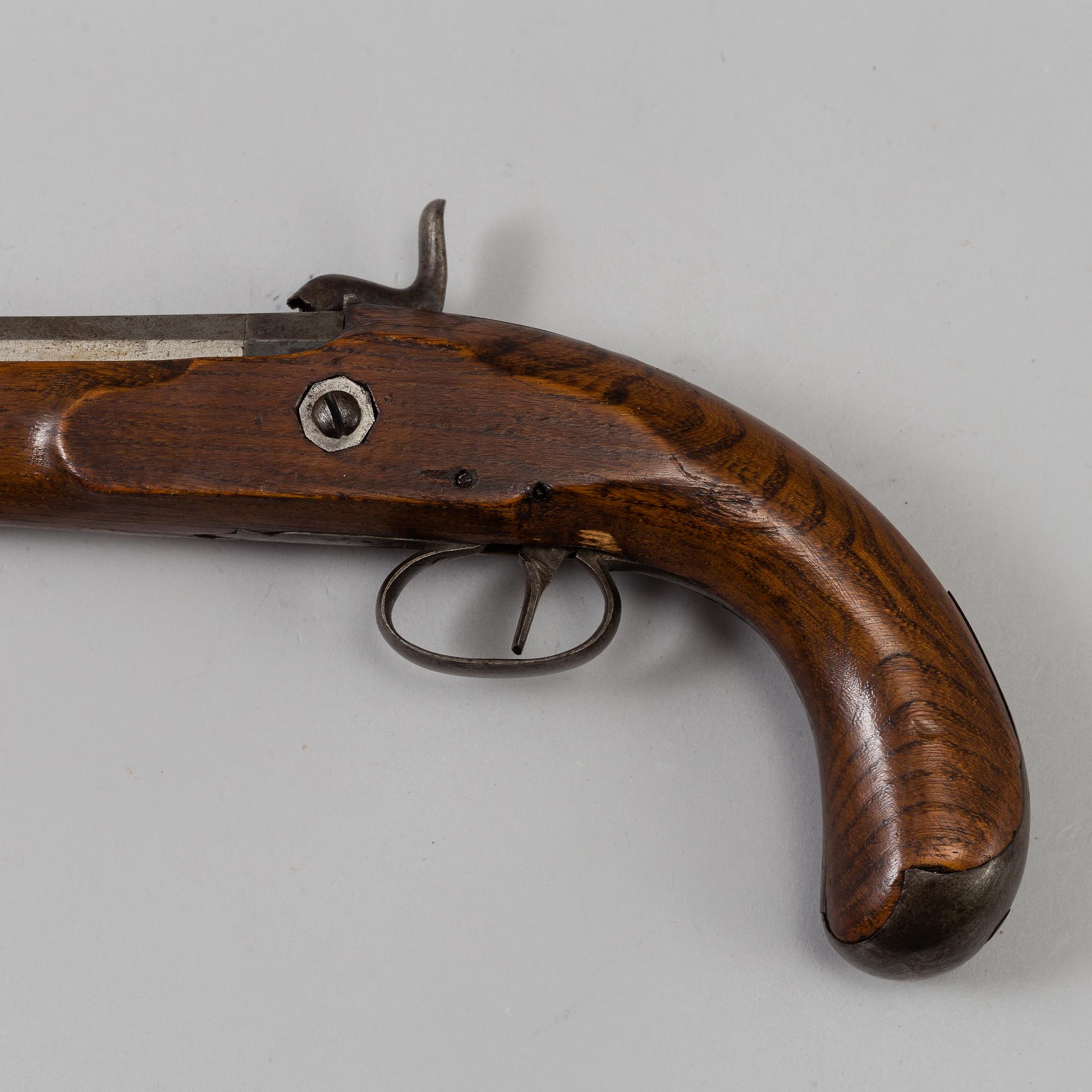 One flint lock postol, late 18th ct, and one percussion pistol, 19th ct.