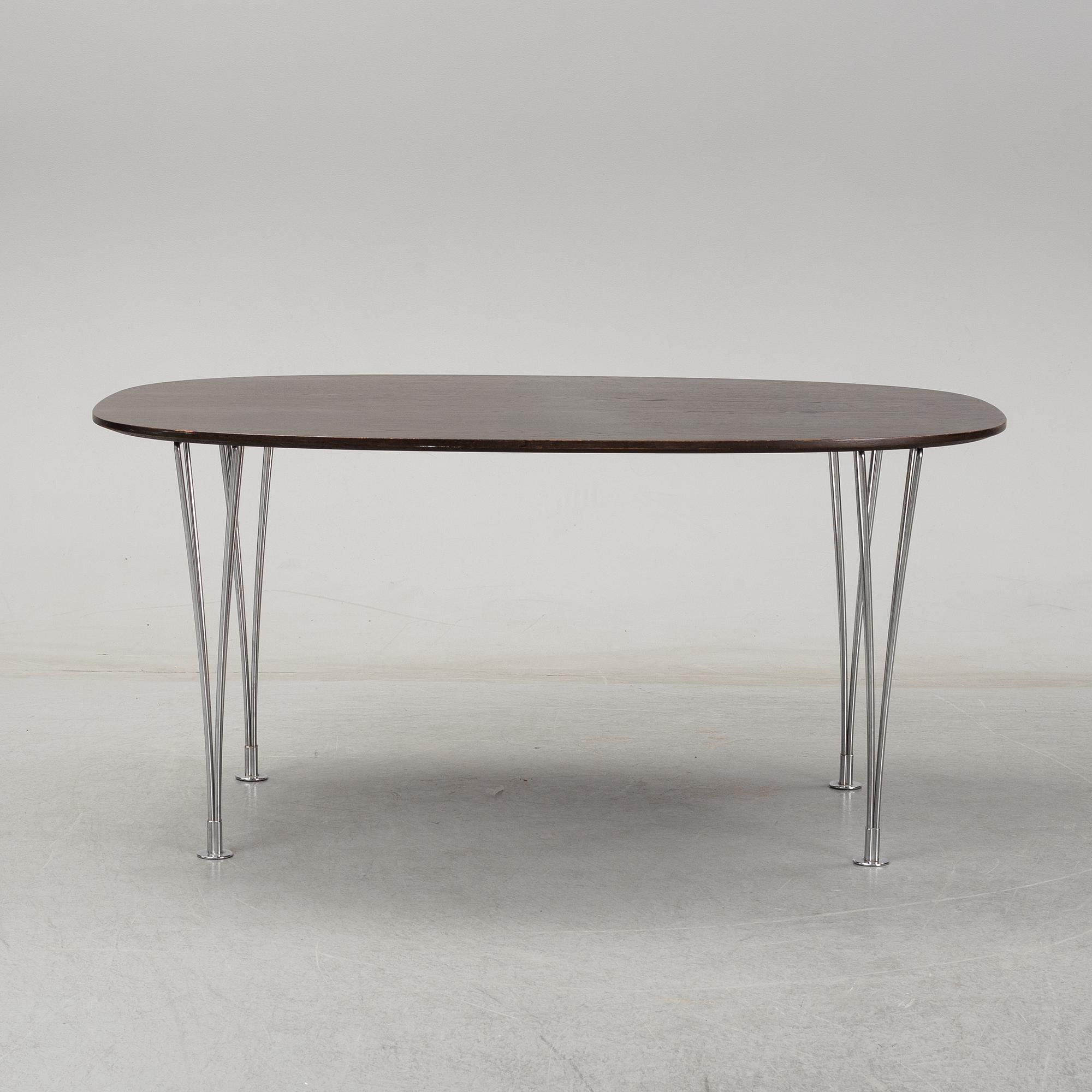 A 'Super-elliptical table by Piet Hein & Bruno Mathsson for Fritz Hansen.