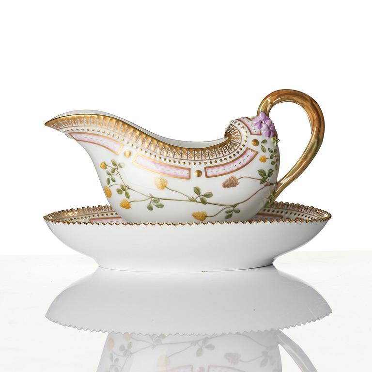 A Royal Copenhagen 'Flora Danica' sauce boat and a pillow shaped bowl, Denmark, 20th century.
