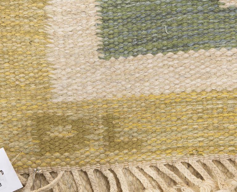 A flat weave signed carpet ca 192x148 cm.