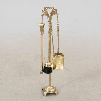 A late 20th century English brass fire tools.