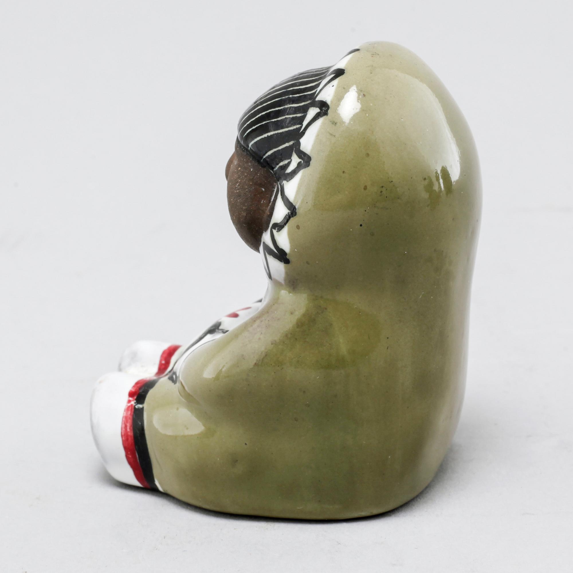Eight stoneware figurines by Uppsala-Ekeby, from the latter half of the 20th century.