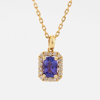 An 18K gold necklace set with a faceted tanzanite.
