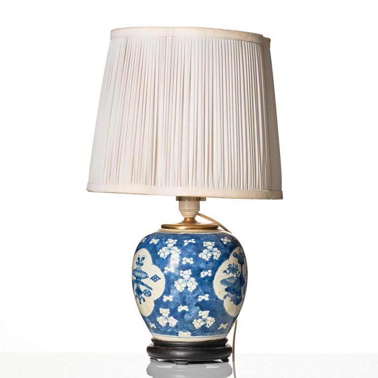 A blue and white jar mounted as a lamp, Qing dynasty, 18th Century.